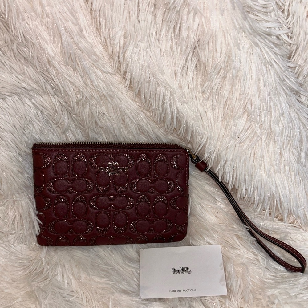 Glitter signature C three-quarter zip Coach wristlet